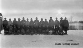 Girls in front of 2nd residential school at Onion Lake, Saskatchewan