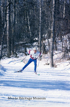 Boy skiing for biathlon event