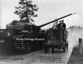 General Worthington drives the last armoured autocar past Centurion tanks, 1956