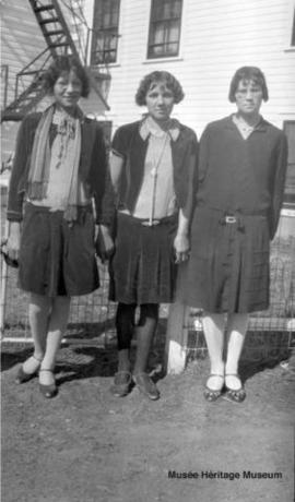 Girls in front of 3rd residential school at Onion Lake, Saskatchewan